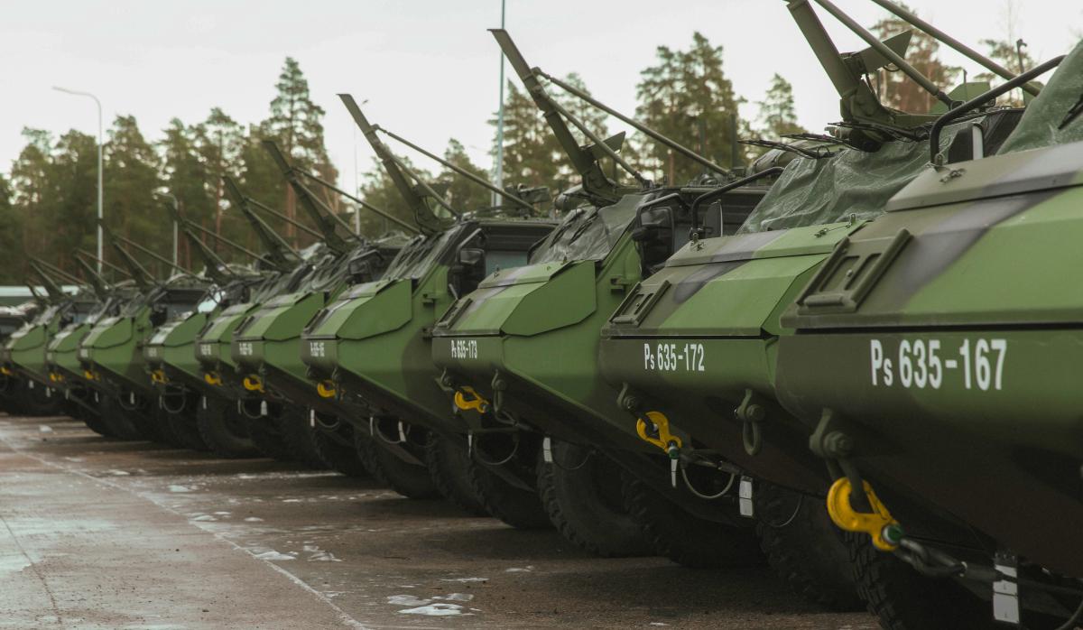 In the picture there are several XA-300 Armoured Personnel Carriers in a row.